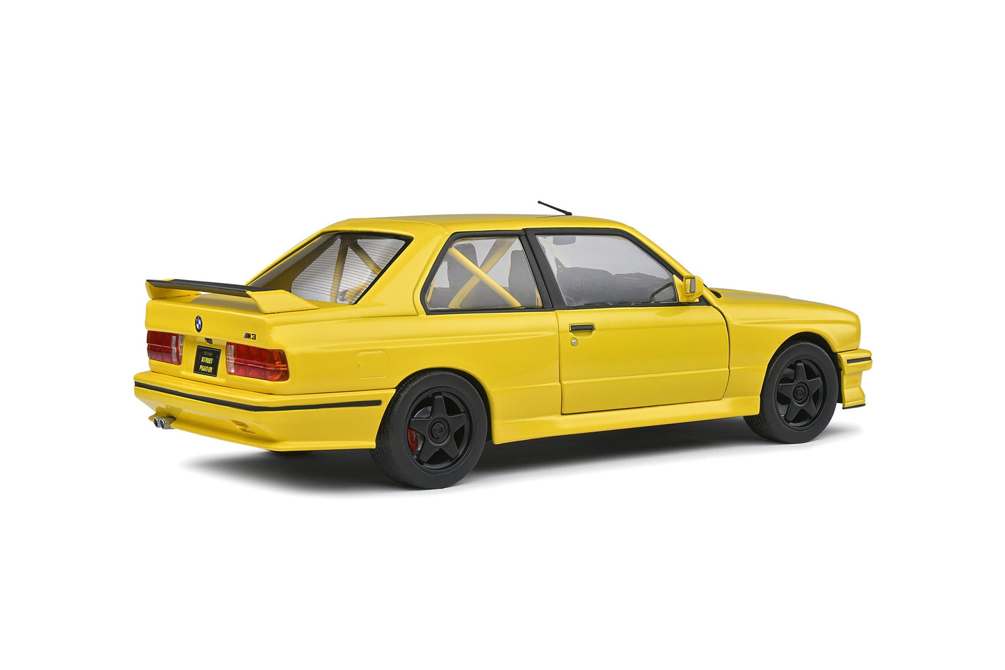 Macheta auto BMW E30 M3 Dakar Yellow "Street Fighter" (1990) 1:18 Solido