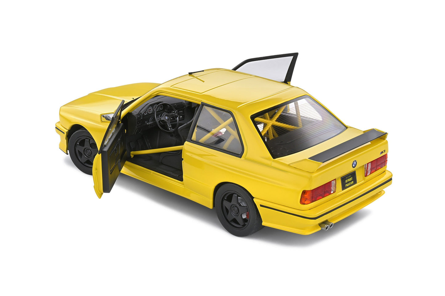 Macheta auto BMW E30 M3 Dakar Yellow "Street Fighter" (1990) 1:18 Solido